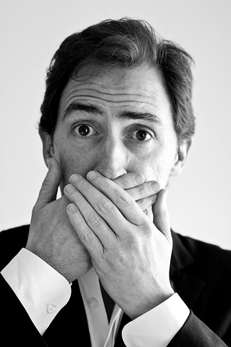 Rob Brydon portrait covering his mouth shot in London